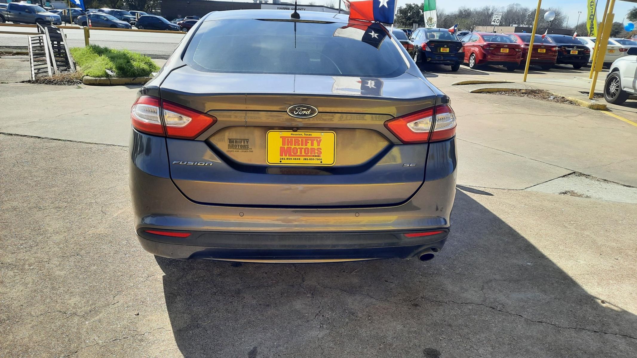2016 Ford Fusion (3FA6P0H71GR) , located at 16710 Clay Rd., Houston, TX, 77084, (281) 859-7900, 29.834864, -95.656166 - Photo #3